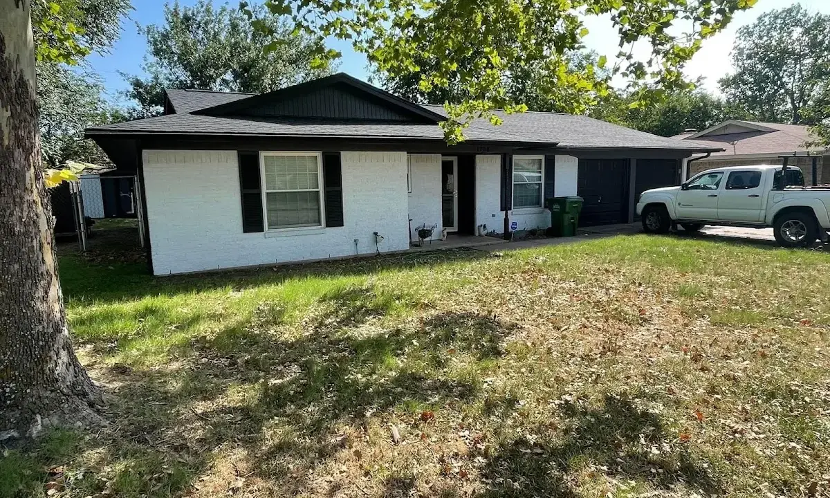 Professional roofing crew working on a residential roof in Los Altos Hills